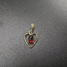 10k yellow gold heart pendant w garnet