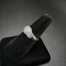 10k white gold ring w baguette diamonds