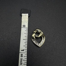 10k yellow gold mom & baby heart pendant w diamonds