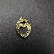 10k yellow gold mom & baby heart pendant w diamonds