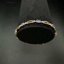 10K yellow gold bracelet w tanzanite stones & diamonds