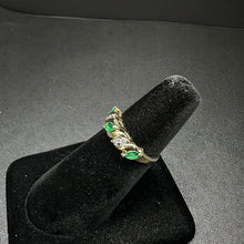 10k yellow gold ring w marquise cut emeralds & diamonds along band