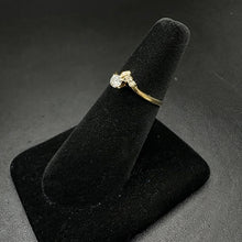 14k gold ring w 15pt diamond