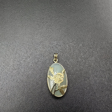 14k gold rose pendant set on jade stone