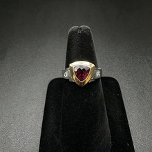 14k two tone ring w garnet stone