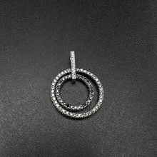 14k white gold pendant w diamonds & black diamonds