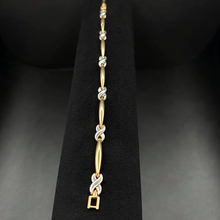 14K yellow & white gold x bracelet