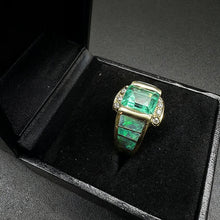 14k yellow gold ring centered w 1 emerald cut emerald, & fire opals w diamonds
