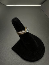 14k gold ring w aquamarine center stone & CZS