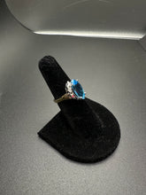14k white gold marquise cut Swiss blue topaz ring