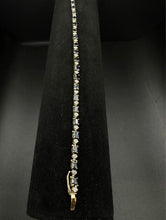 14k yellow gold diamond & blue sapphire bracelet