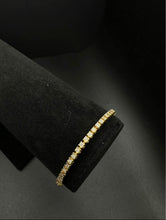 10k yellow gold tennis bracelet w 1.25 cttw in diamonds