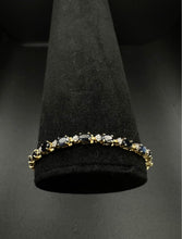 14k yellow gold diamond & blue sapphire bracelet