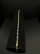 10k yellow gold diamond & blue sapphire bracelet