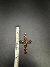18k gold cross pendant w garnet stones