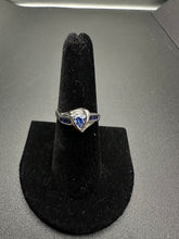10k white gold ring w trillion cut blue sapphire stones