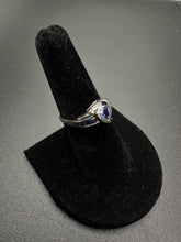 10k white gold ring w trillion cut blue sapphire stones