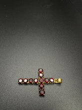 18k gold cross pendant w garnet stones