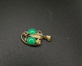 14k gold pendant w jade stones