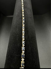 14k yellow gold diamond & blue sapphire bracelet