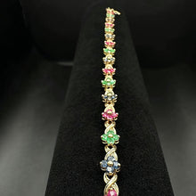 14K yellow gold flower bracelet w precious stones