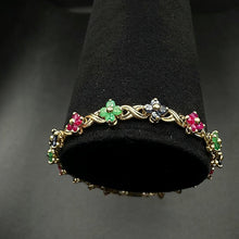 14K yellow gold flower bracelet w precious stones