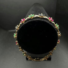 14K yellow gold flower bracelet w precious stones
