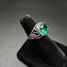 925 silver ring w central green stone in center & czs