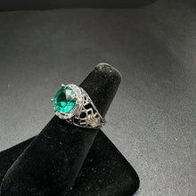 925 silver ring w central green stone in center & czs