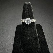 925 silver ring w big cubic zirconia in center , & on band