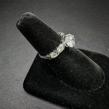 925 silver ring w big cubic zirconia in center , & on band